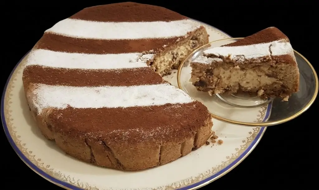Cassata siciliana al forno con crema di ricotta e cioccolato friabile e dal gusto delicato.