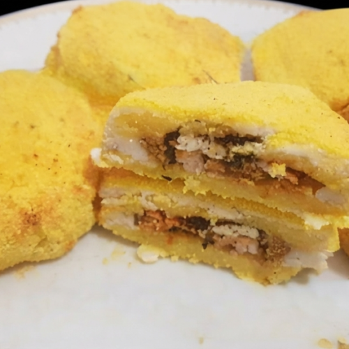 Cordon bleu con salsa alla curcuma/soufflè di funghi/cuori di polenta fritta