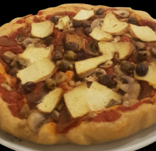 Pizza vegana ad idratazione del 100% con semola e doppia cottura padella e forno “affettato veg , tofu affumicato ,olive taggiasche e funghi “