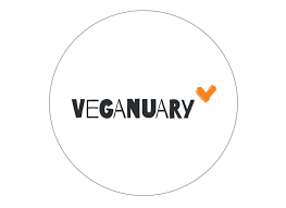 Logo del Veganuary con la parola 'VEGANUARY' in caratteri neri e una spunta arancione.