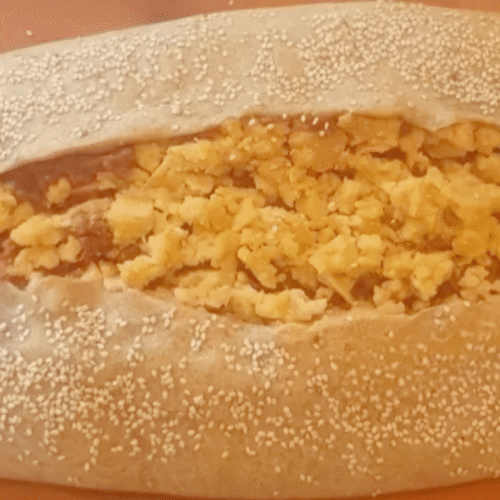 Caramella gigante di brisèe al vino bianco con ragù di lenticchie e funghi e scamorza affumicata